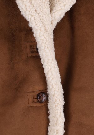 Brown faux suede jacket with a fluffy cream-colored collar, featuring a dark brown button and a simple, classic design.