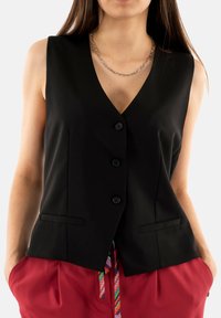 PLEASE Smanicato - noir