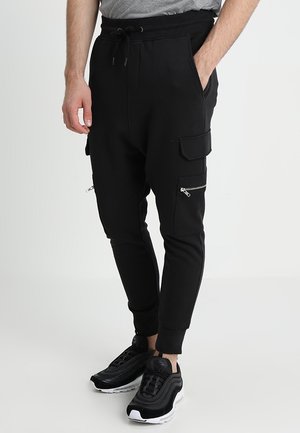 Pantalones deportivos - black