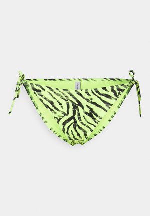 Neon grön bikinibyxor med ett svart zebramönster, med snöre på varje sida och en etikett bak i mitten.