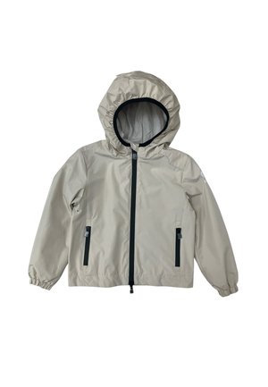 Giacca leggera beige con cappuccio, cerniera nera e dettagli delle tasche, polsini elasticizzati e piccolo logo sulla manica sinistra.