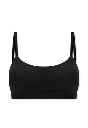 Bralette nera senza soluzione di continuità con spalline sottili regolabili e fascia ampia sotto il seno, progettata per un comfort quotidiano.