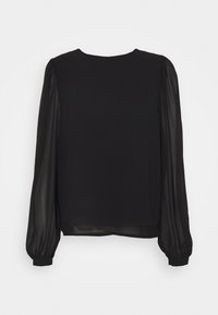 Top negro con cuerpo de tela sólida y mangas largas abullonadas y transparentes. Presenta un escote redondo y puños elásticos en los extremos de las mangas.