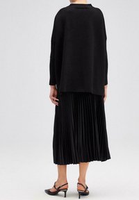 Touché Privé Sweter