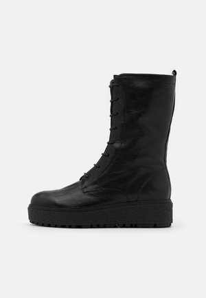 Platform ankle boots - nero