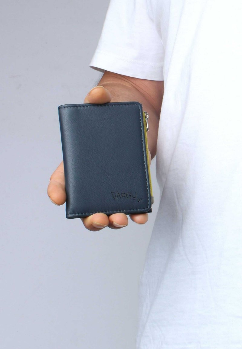 Navy leather wallet with yellow accents, square shape, and zipper closure. Features a debossed logo on the front. Compact design, easy to hold.