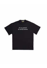 T-shirt in cotone nero con maniche corte e colletto tondo. Presenta del testo bianco sulla parte anteriore che recita: "Non è personale. È solo affari."