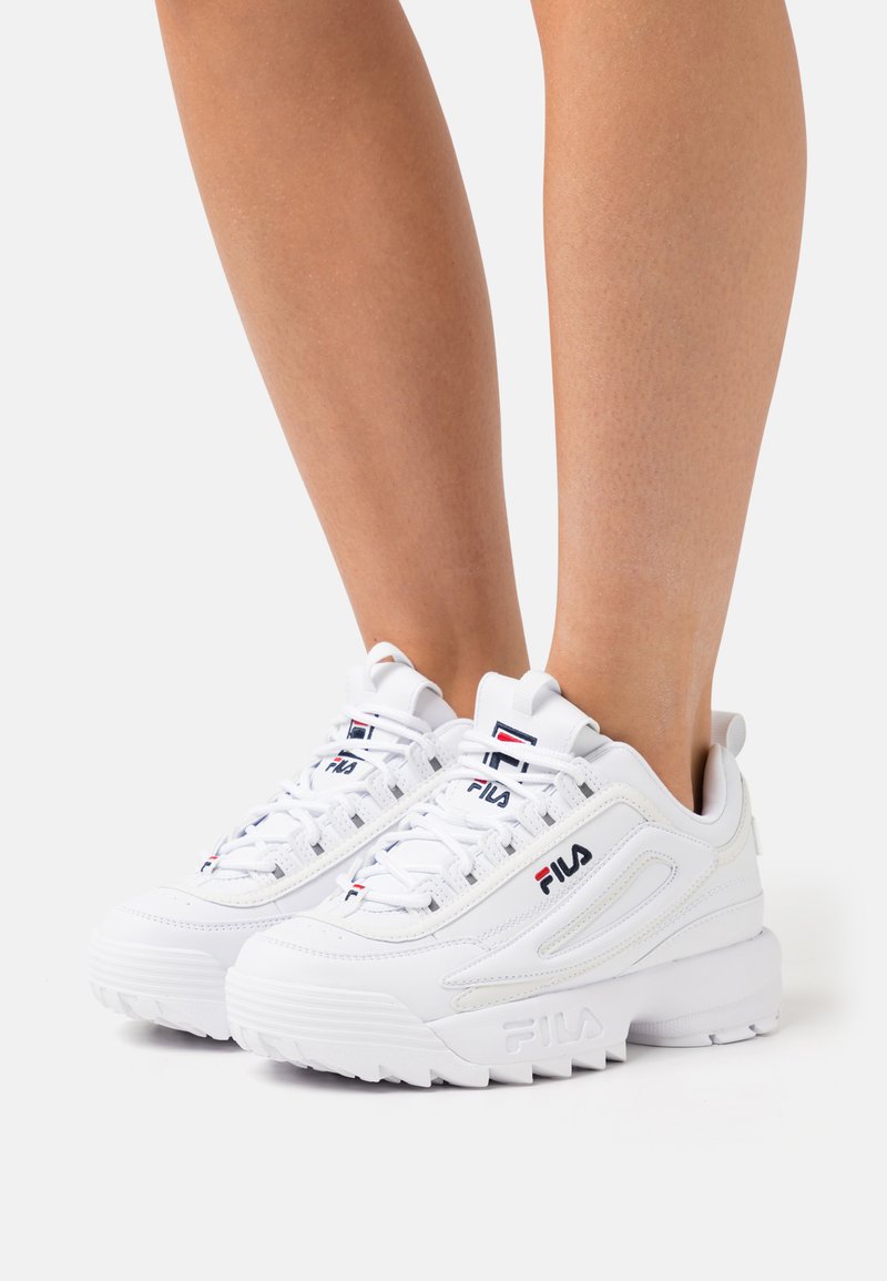 fila disruptor trainers in white