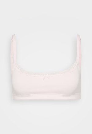 Light pink bralette made of smooth material with lace trim along the neckline and a small bow detail at the center. Adjustable straps.