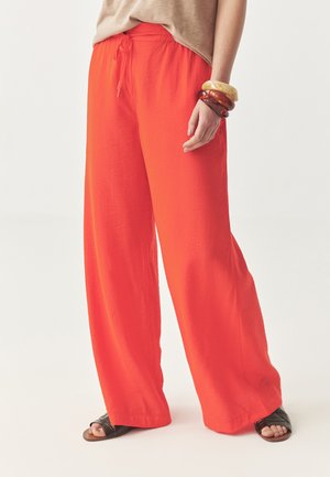 TATUUM NAMALIKO - Pantaloni - orange