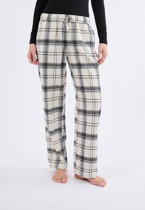 Pantalones de pijama a cuadros en crema con patrón de cuadros en negro y gris, con cinturilla elástica y cordón, fabricados en suave algodón.
