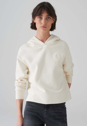 Crème-kleurige hoodie met een V-hals, ribgebreide manchetten en zoom. Voorzien van een reliëflogo aan de voorkant. Gemaakt van zachte, textuurstof.