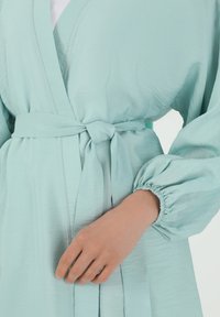 Modanisa BENIN - Krátký kabát - light green