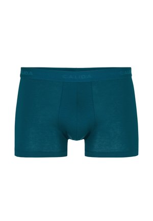 Boxer briefs in solid teal, featuring a soft elastic waistband with 'CALIDA' logo, made from smooth, lightweight material.