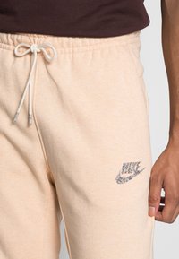 Nike Sportswear REVIVAL - Calças de fato de treino - white ony