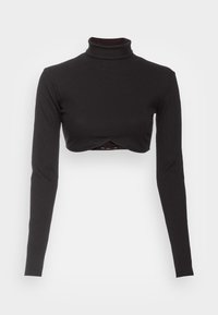Svart, rippad kort turtleneck med långa ärmar och en korsad design fram. Materialet verkar elastiskt och ger en figurnära silhuett.