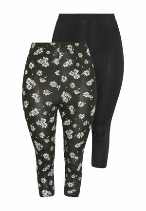 To par kvinders korte leggings, den ene ensfarvet sort og den anden sort med et hvidt margueritmønster.