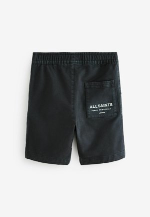 Melni auduma šorti ar elastīgu jostasvietu, ar aizmugurējo kabatu, kurā ir baltais "ALLSAINTS" zīmols un smalki šuvuma akcenti.