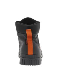 Black waterproof ankle boot with a textured rubber sole, padded collar, and orange pull tab at the back for easy wear.