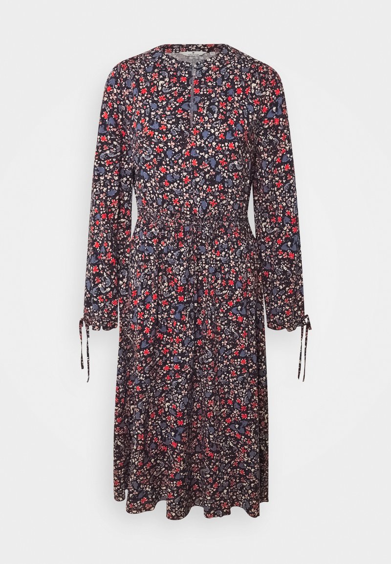 Floral long-sleeved dress in navy blue with red and white patterns, featuring a gathered waist and tie details at the sleeve ends.
