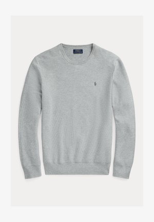 Helehall halliga särk, ribbed varrukad ja ääred, tekstureeritud kangas, millel on vasakul rinnal väike tikitud logo.
