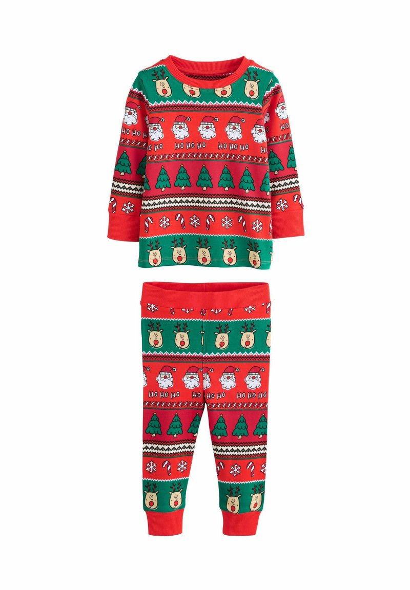 Set di pigiami a tema festivo rosso e verde con motivi di Babbo Natale, renne, alberi, fiocchi di neve e bastoncini di zucchero. Tessuto morbido.