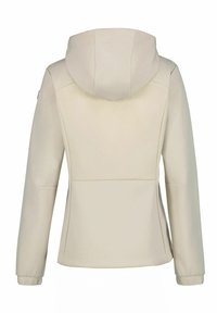 Světle béžová bunda s kapucí, má tapered design, hladkou texturu, kontrastní švy a elastické manžety. Žádné viditelné kovové detaily.