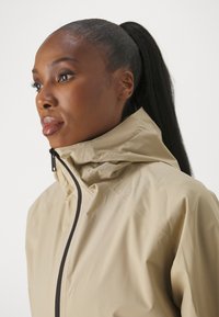 Jack Wolfskin MAINKAI - Impermeabile - sand storm