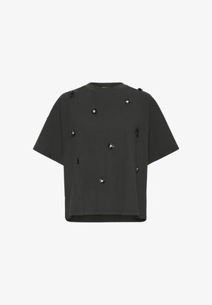 Schwarzes Baumwoll-T-Shirt mit kurzen Ärmeln, oversized Passform, versehen mit gruppierten Blumenstickereien und kontrastierenden Elementen über das gesamte Kleidungsstück.