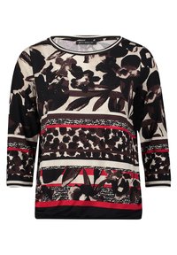 Maglia a maniche lunghe con un design a stampa floreale e animale nei colori nero, crema e rosso, con scollatura rotonda e vari modelli di trame texture.