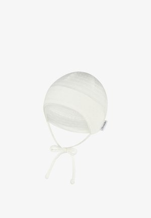 Soft white baby bonnet with delicate dotted texture and ties secured in a bow under the chin, labeled "Sterntaler."