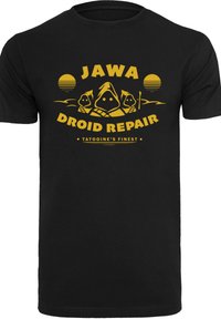 Juodas marškinėliai su geltonu grafiniu dizainu, vaizduojančiu Jawas, tekstas "JAWA DROID REPAIR" ir apskritimo akcentai žaismingoje kompozicijoje.