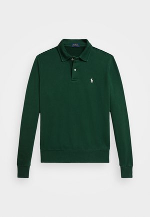 Zielona, długosleeve polówka z miękkiego materiału, z klasycznym kołnierzykiem, zapięciem na guziki i małym haftowanym logo na piersi.