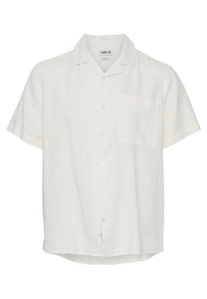 Kortermet skjorte med knapper i lys kremfarget lin. Har brystlomme, klassisk krage og subtil tekstur med rett søm.