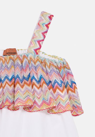 Ύφασμα με πολύχρωμο ζιγκ-ζαγκ μοτίβο και μεταλλικές πινελιές· λευκή βάση με πτυχώσεις στην κορυφή· ρυθμιζόμενο λουράκι· ετικέτα με το εμπορικό σήμα.