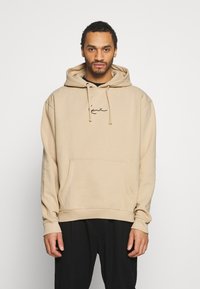 Karl Kani UNISEX SMALL SIGNATURE HOODY  - Sweatshirt com capuz - sand