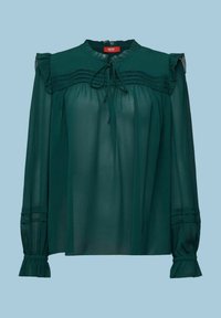 Blouse transparente vert foncé avec manches longues, poignets et épaules à volants, empiècement plissé et détail noué au col.