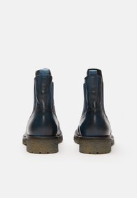 Felmini Botines - petroleo