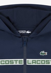 Lacoste GRID TAPED HOODED SET - Treniņtērps - marine