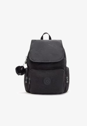 Black fabric backpack with a flap closure, front zip pocket, side zip pockets, and a furry animal keychain attached. Round logo detail visible.