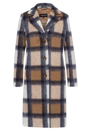 Pitkä ruudullinen takki, jossa ruskeita, beigejä, mustia ja valkoisia neliöitä, kauluskäänteillä ja kolme ruskeaa napillista nappia edessä.