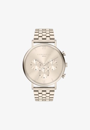 Rund ur i rustfrit stål med en lys guldfinish, der har en minimalistisk urskive, chronograf underur og et slankt metalarmbånd.