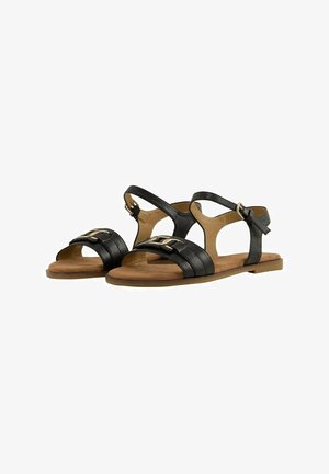 Black leather sandals with an open design, featuring two front straps and a backing strap with a silver buckle. Soft tan footbed.