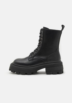 NABU LACE UP MID - Fűzős bokacsizmák - black