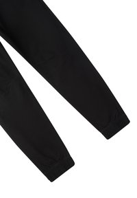 Pantaloni sportivi neri realizzati in un tessuto morbido e elastico. Dotati di polsini e cuciture elastiche per un look aderente. Design minimalista senza pattern.