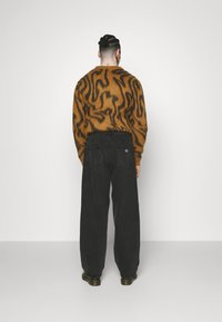 Obey Clothing BIGWIG BAGGY - Vrećaste traperice - black