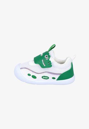 Zapatilla deportiva para bebé blanca y verde con tejido de malla, correa con cara de dinosaurio y texto "BABY" en el lateral, diseñada para niños pequeños.