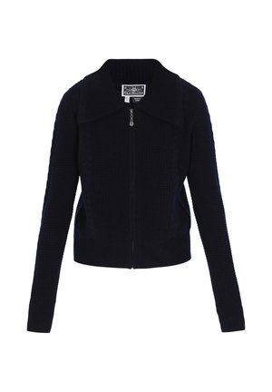 Cárdigan de punto azul marino con cuello plano, cierre de cremallera completo, puños acanalados y patrones texturizados en el cuerpo. Color sólido, de longitud corta.