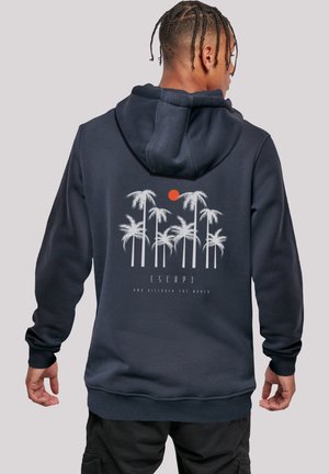 Navy hoodie made of cotton blend featuring a palm tree graphic and sun design on the back. Includes a drawstring hood and ribbed cuffs.