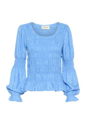 Šviesiai mėlyna bliuskutė su susiraukšlėjusiu tekstūru, ilgomis pūstu suknelėmis ir plasdumu. Turinti apvalų iškirpimą ir lygaus, blizgaus audinio.